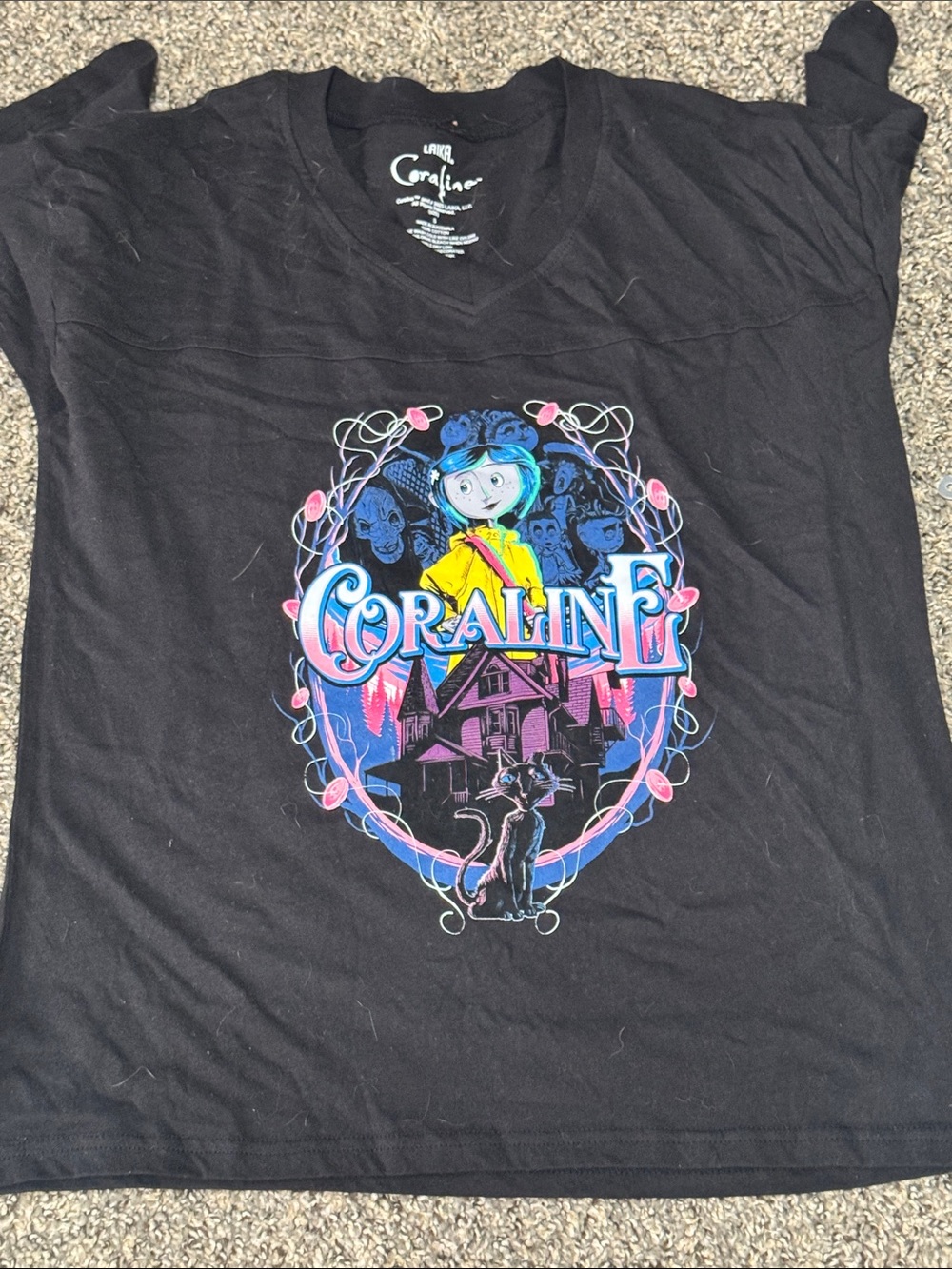 Black Graphic Tee with Colorful Film Art